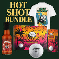 CAPRI Hot Shot Bundle with Golf of Wall Street shirt, Slice From Hell hot sauce, and Capri Sundowner golf balls in vibrant packaging